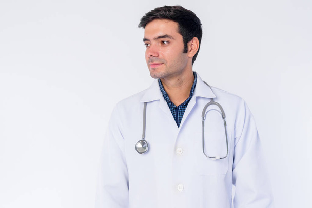 Face of young Persian man doctor thinking - Foto, Imagem