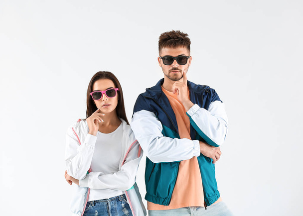 Fashionable young couple on white background - Foto, immagini