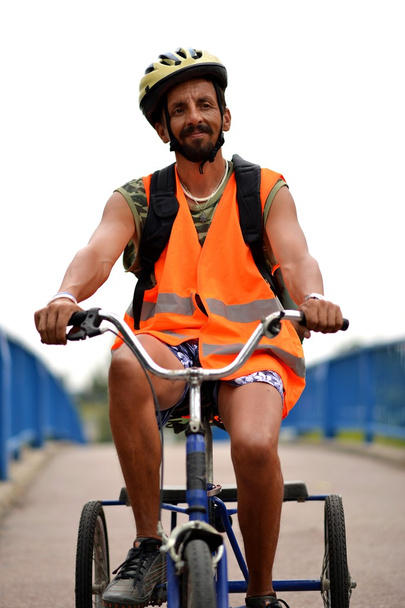 Mies Ratsastus kolmipyörä
 - Valokuva, kuva