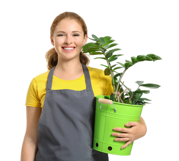 Portret van vrouwelijke tuinman op witte achtergrond - Foto, afbeelding