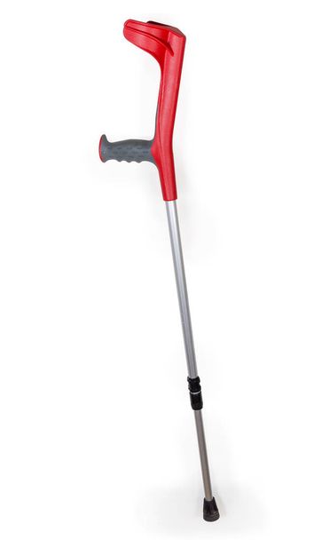 Metal elbow crutch with plastic handle on a white background - Zdjęcie, obraz
