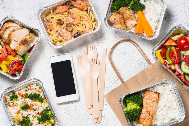 Food delivery concept - healthy lunch in boxes. - Photo, Image