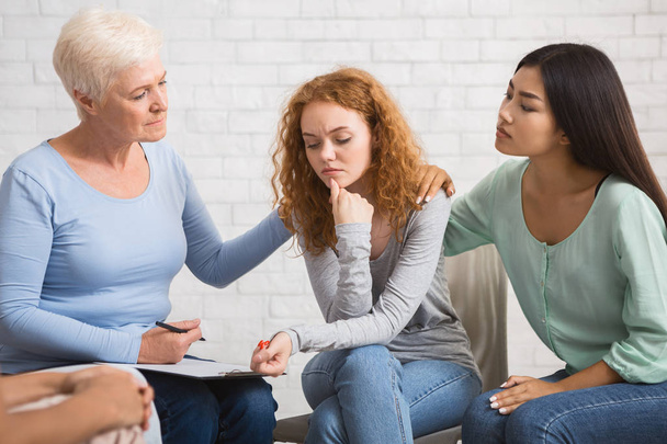 Diverse Women Supporting Depressed Girl On Group Therapy Session Indoor - Fotoğraf, Görsel