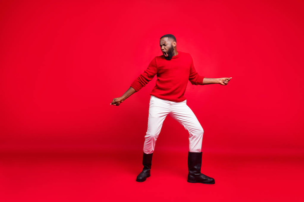 Full length body photo of positive cheerful mad guy having fun joy handsome stylish dancing modern moves wearing bright pullover hip-hop person in white pants shoes isolated vivid color background - Foto, Imagem