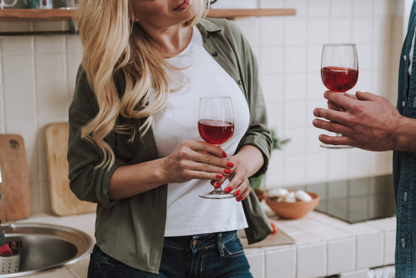 Loving couple drinking red wine at home - Zdjęcie, obraz