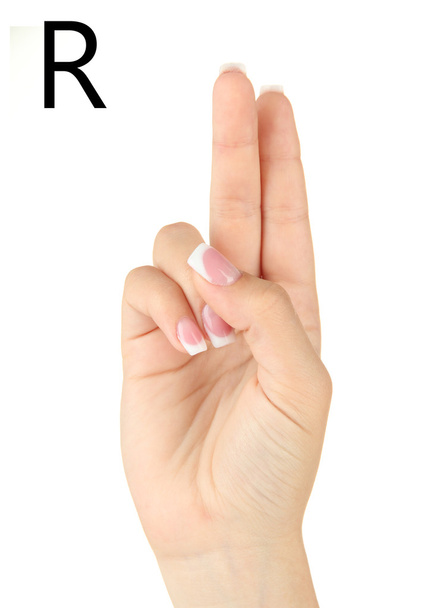 Finger Spelling the Alphabet in American Sign Language (ASL). Letter R - 写真・画像