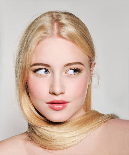 Portrait of beautiful blonde young woman face.  Spa model girl w - Фото, зображення