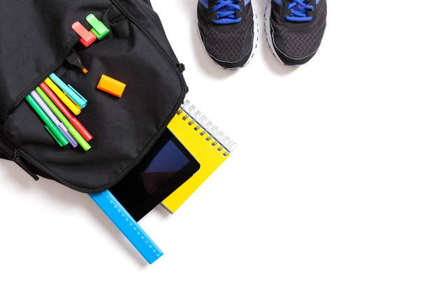 Back to school concept. Backpack with school supplies, tablet an - Фото, зображення