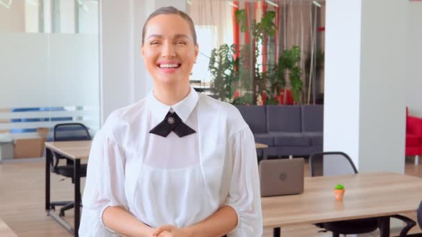 cheerful entrepreneur smiling in office - Кадры, видео