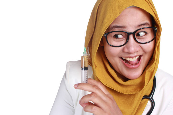Muslim Female Doctor Holding Injection Syringe - Photo, image
