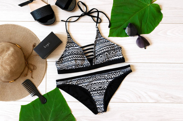 tropical summer flat lay with swimsuit and accessories - Photo, Image