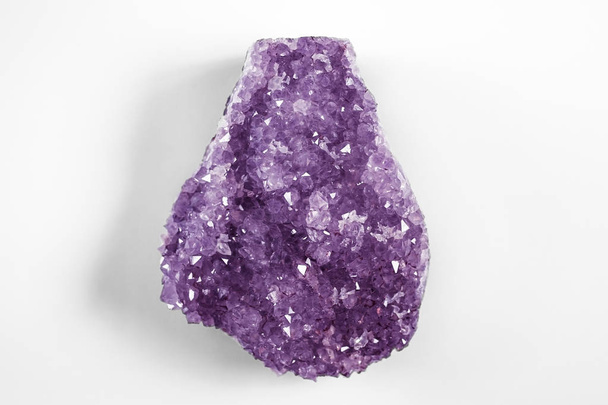 Large colorful purple amethyst crystal close up on white background. - Photo, Image
