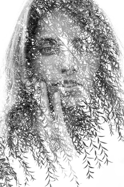 Double exposure close up of a young natural beauty combined with - Foto, Imagem