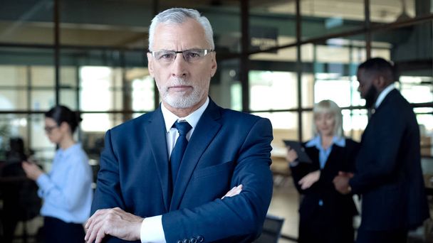 Self-confident aged man in suit looking camera, business leader, company career - Fotoğraf, Görsel