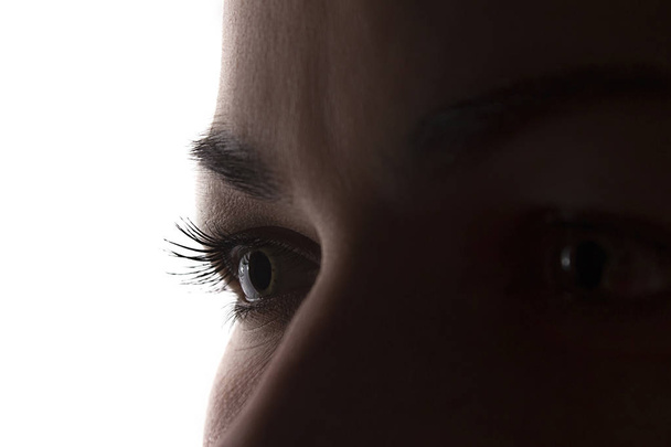 Young woman eye look ahead, closeup - silhouette - Фото, изображение