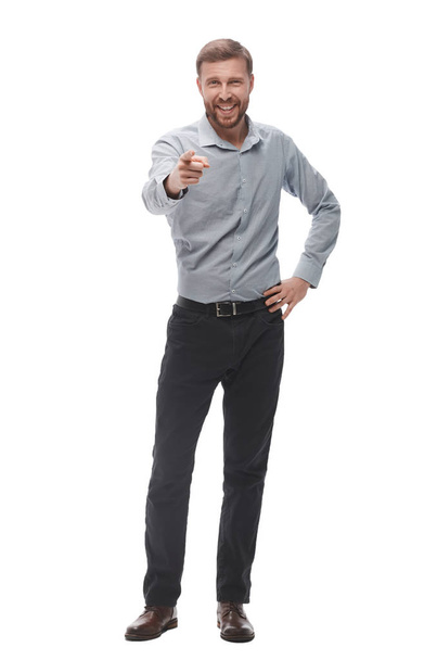 in full growth. serious young businessman pointing at you - Foto, Bild