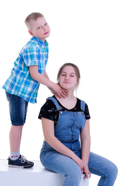 A brother and sister, a girl and a boy are photographed in a stu - Photo, image