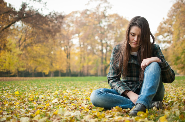 Young woman in depression outdoor - Photo, image