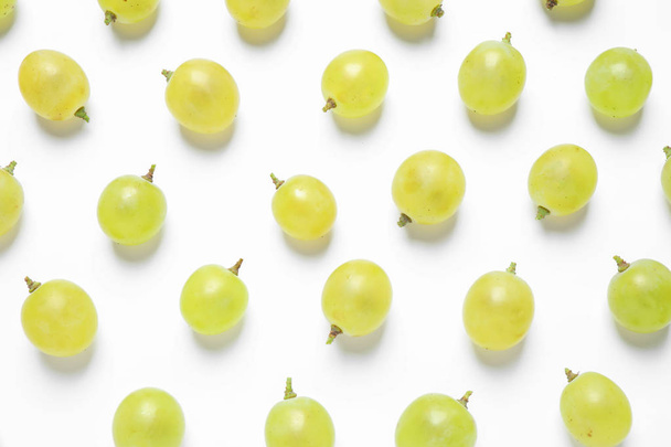 Fresh ripe juicy grapes on white background, top view - Photo, image