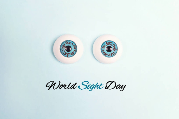 World sight day poster with decorative eyes on a blue background - Zdjęcie, obraz