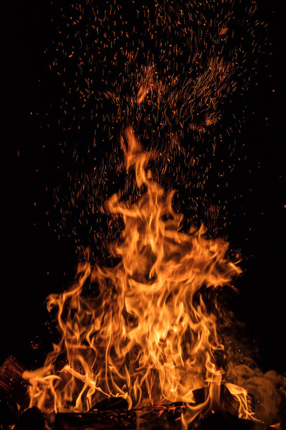 Texture of fire on a black background. - Photo, Image