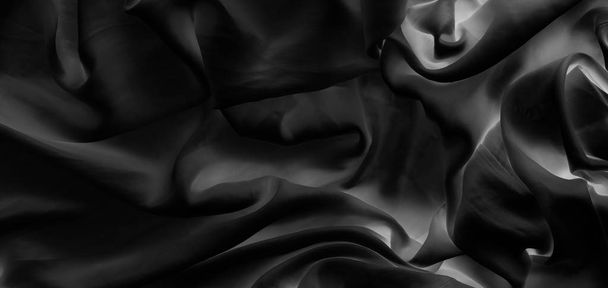 Luxusní černá jemná hedvábná textura plochého pozadí, dovolená - Fotografie, Obrázek