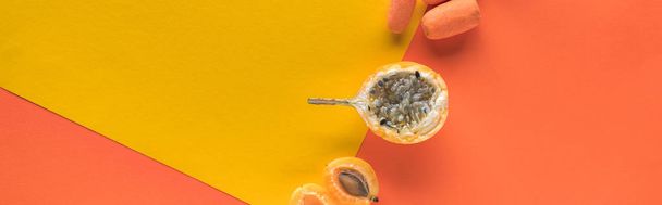 top view of delicious fruits and vegetables on yellow and orange background with copy space, panoramic shot - Fotografie, Obrázek