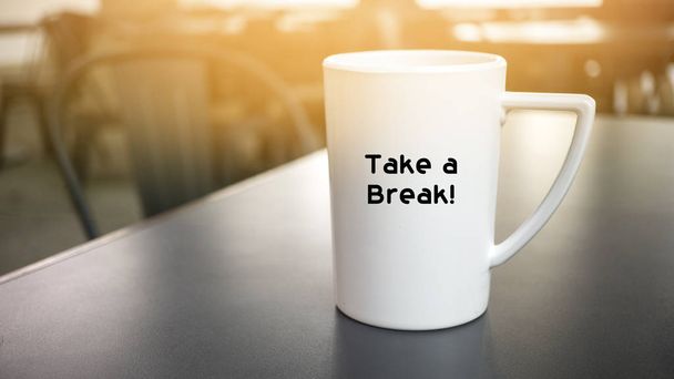 TAKE A BREAK concept - mug of coffee at the cafe - Φωτογραφία, εικόνα