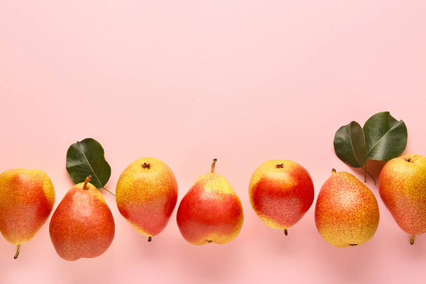 Sweet ripe pears on color background - Photo, Image