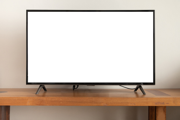 blank screen television on wooden table at living room. - Photo, Image