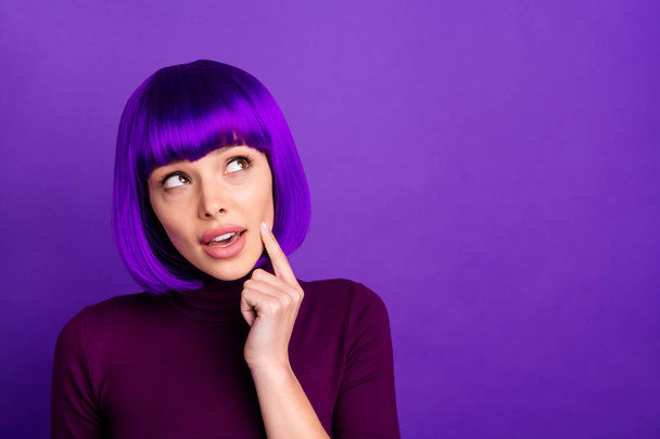 Close up photo of minded person looking up touching her chin having thoughts wearing turtleneck isolated over purple violet background - Фото, зображення