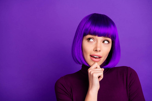 Close up photo of minded youth touching her chin looking up wearing turtleneck isolated over purple violet background - Photo, image
