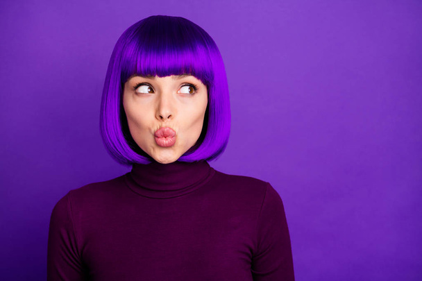 Close up photo of cute girl look at copy space wearing turtleneck isolated over purple violet background - Valokuva, kuva