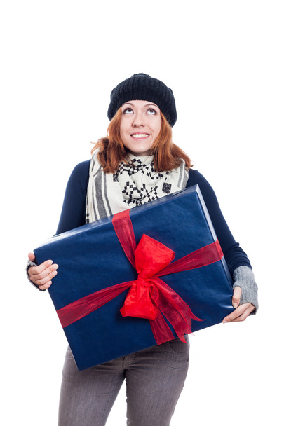 Satisfied woman with big gift looking up - Photo, Image