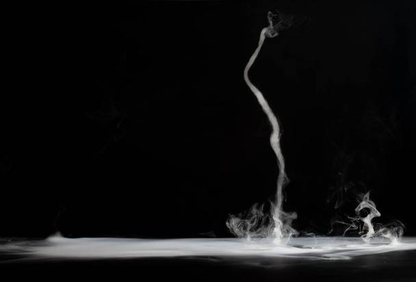 Abstract smoke on a dark background. Isolated - Valokuva, kuva