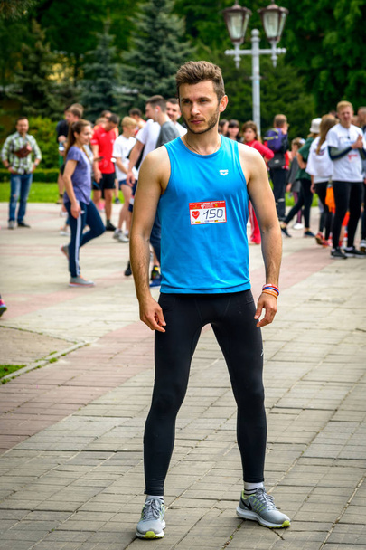 POLTAVA, UKRAINE - MAY 12, 2019: Inhabitants of the city take part in the charity race "Run for the sake of the child's health". Action "Heart to Heart" - Photo, Image