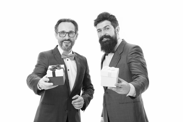 Gift with love. Gift for spouse. Romantic surprise. Men formal suits hold gift boxes white background. Love and romantic feelings concept. Valentines day gift. Men with beard celebrate valentines day - Fotoğraf, Görsel