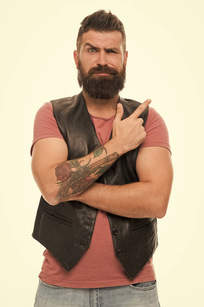 brutal male with tattoo. Male barber care. Hair and beard care. Bearded man. Confident and handsome Brutal man. Mature hipster with beard. Making his beard perfect. Bearded and stylish - Photo, Image
