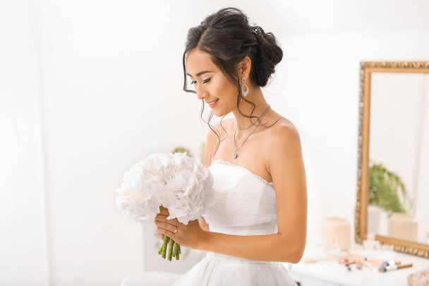 Beautiful young Asian bride at home - Photo, Image