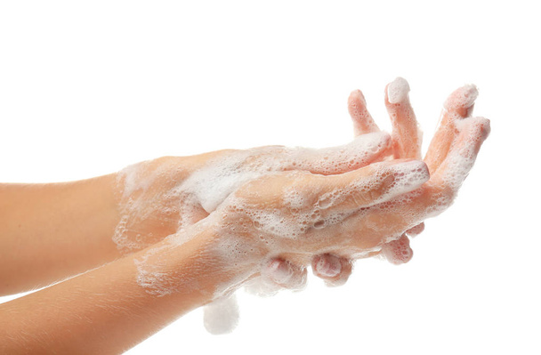 Женские руки с пеной для мыла на белом фоне
 - Фото, изображение