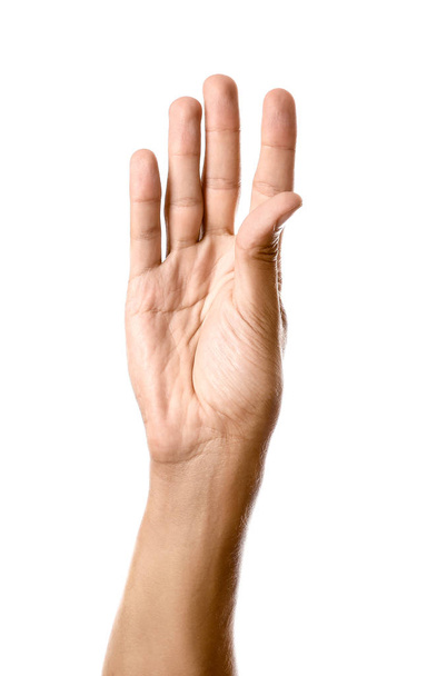 Mão masculina com palma aberta sobre fundo branco
 - Foto, Imagem