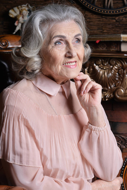 portrait of happy senior woman at home - Fotó, kép