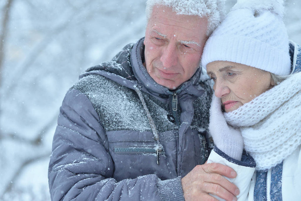 sad  senior couple at winter outdoors - Zdjęcie, obraz