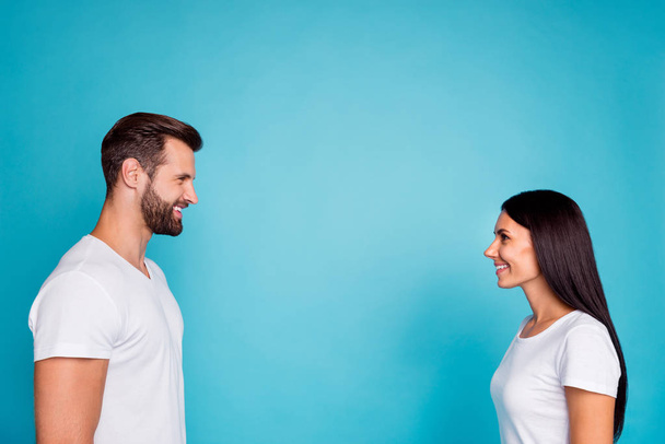 Photo of nice pair look eyes glad finally meeting wear casual outfit isolated blue background - Foto, immagini
