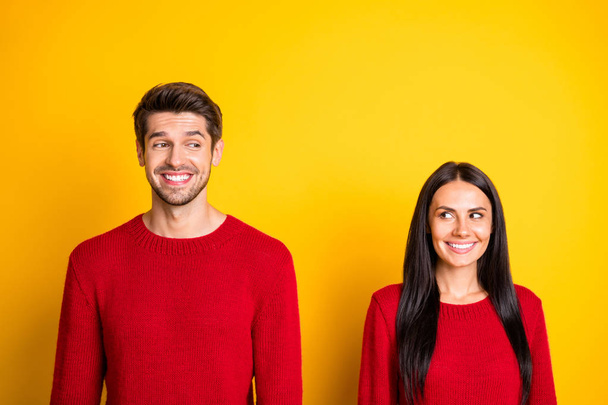 Portrait of lovely couple look having date wear red pullover isolated over yellow background - Foto, Imagem