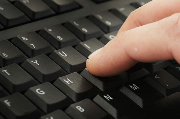 Finger pressing keyboard - Photo, Image