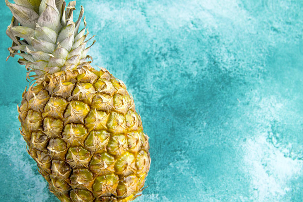 fresh pineapple on a blue background - Photo, Image