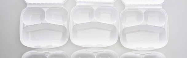 beyaz arkaplanda boş eko paketlerin panoramik görüntüsü  - Fotoğraf, Görsel