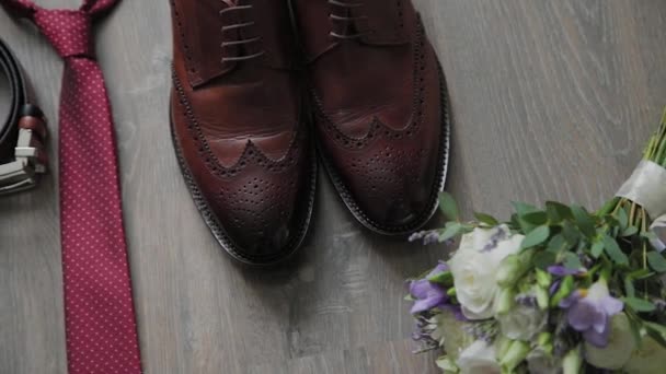 Beautiful men wedding accessories. Shoes, rings, bouquet, belt and tie. - Footage, Video