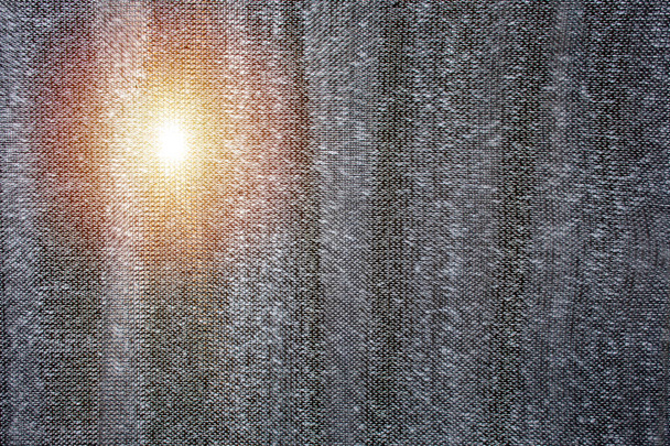 Zwarte kleur kunststof licht filter mesh Sheet met Sun Shine. - Foto, afbeelding
